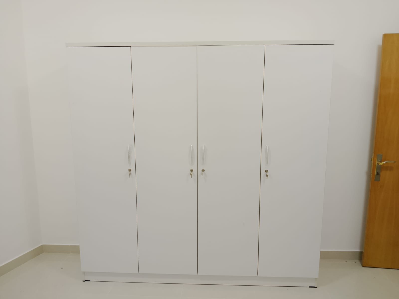 White 4-Door Wardrobe Exterior – Brand Furniture Selling Dubai